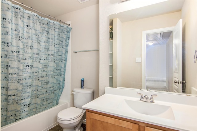 full bathroom featuring vanity, toilet, and shower / bath combo with shower curtain