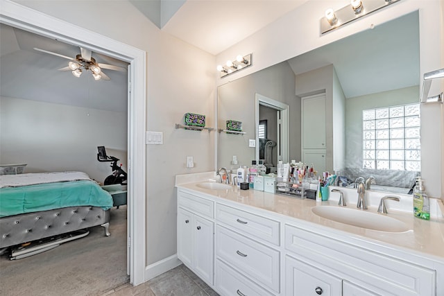 bathroom featuring ceiling fan and vanity