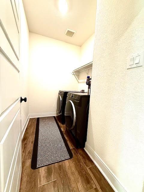 laundry room featuring washer and clothes dryer