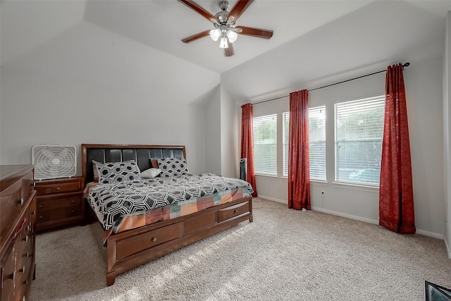 bedroom featuring ceiling fan, light carpet, and lofted ceiling