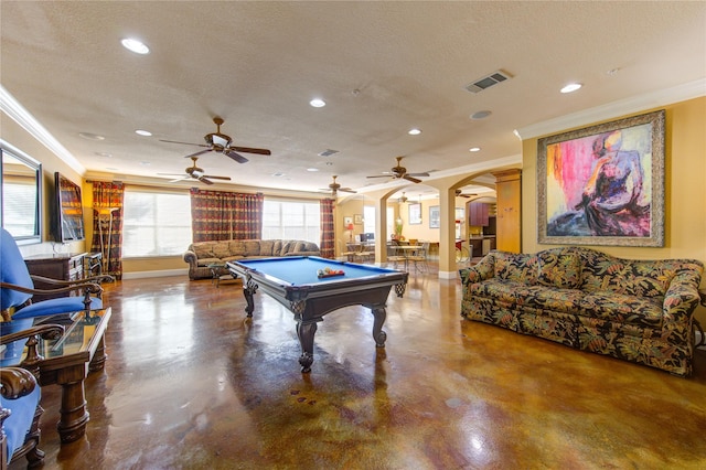 rec room with concrete flooring, a textured ceiling, ornamental molding, and billiards