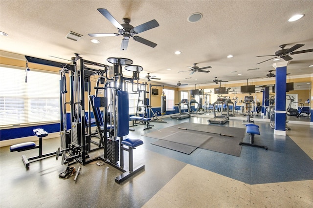 workout area featuring a textured ceiling