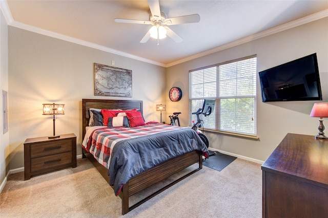 bedroom featuring light colored carpet, ceiling fan, and ornamental molding