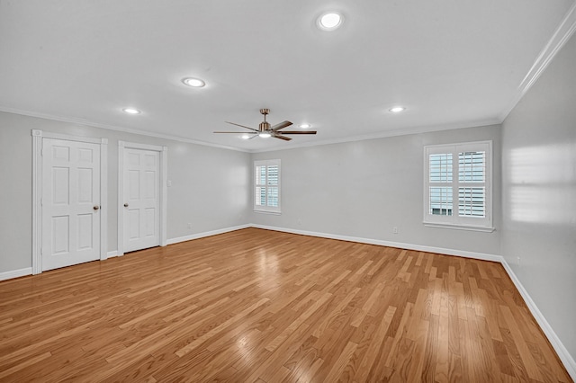 unfurnished room with light hardwood / wood-style floors, ceiling fan, and crown molding