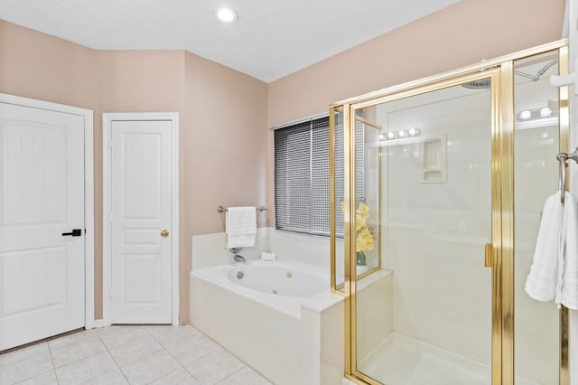 bathroom featuring tile patterned floors and plus walk in shower