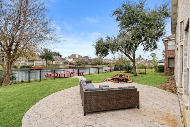 view of patio with a water view