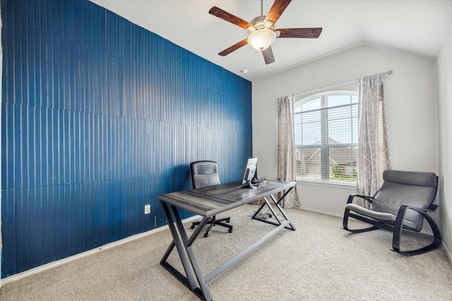 office area featuring ceiling fan, carpet floors, and vaulted ceiling