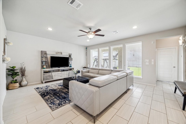 living room with ceiling fan