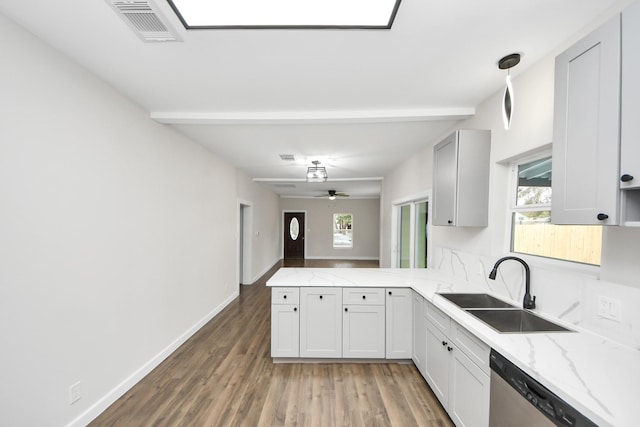 kitchen with sink, dark wood-type flooring, dishwasher, white cabinets, and kitchen peninsula