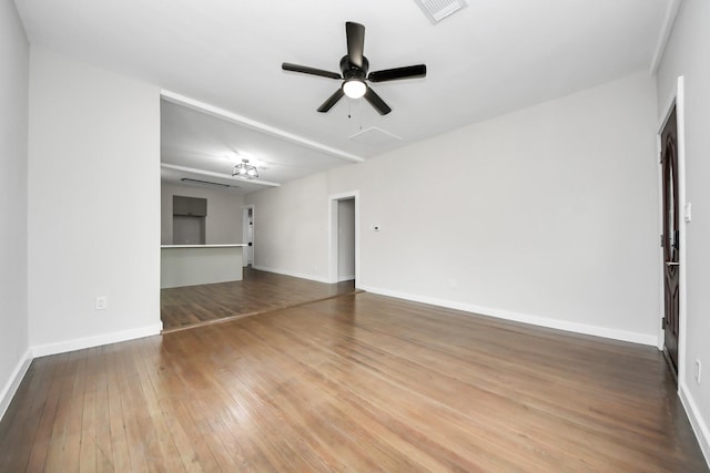 empty room with wood-type flooring and ceiling fan