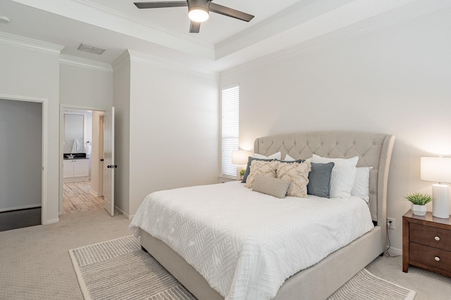 bedroom with ornamental molding, light carpet, and ceiling fan