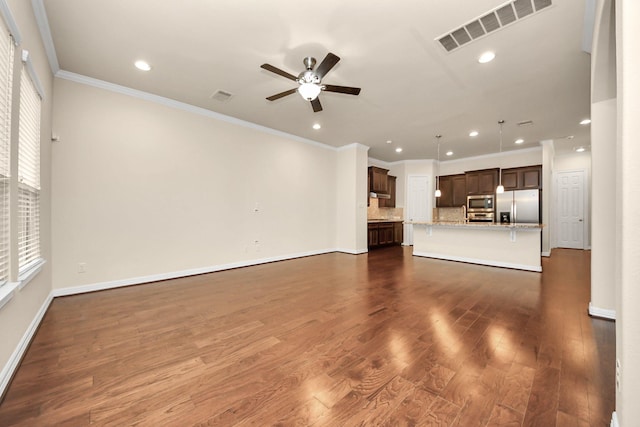 unfurnished living room with ceiling fan, dark hardwood / wood-style flooring, and ornamental molding