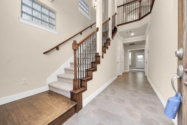 entryway featuring a high ceiling