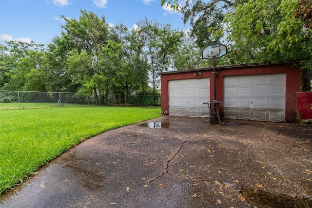 garage with a yard