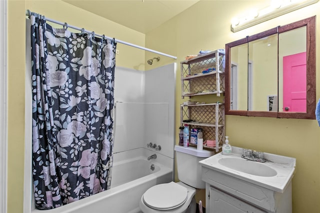 full bathroom with shower / bath combination with curtain, vanity, and toilet