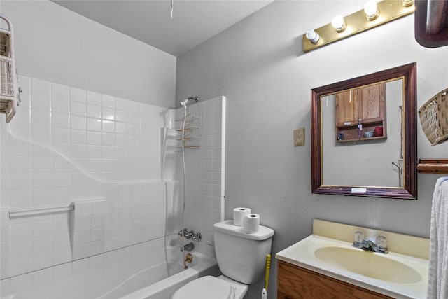 full bathroom with vanity, toilet, and washtub / shower combination