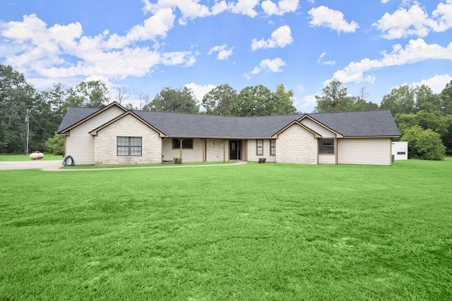 single story home featuring a front yard