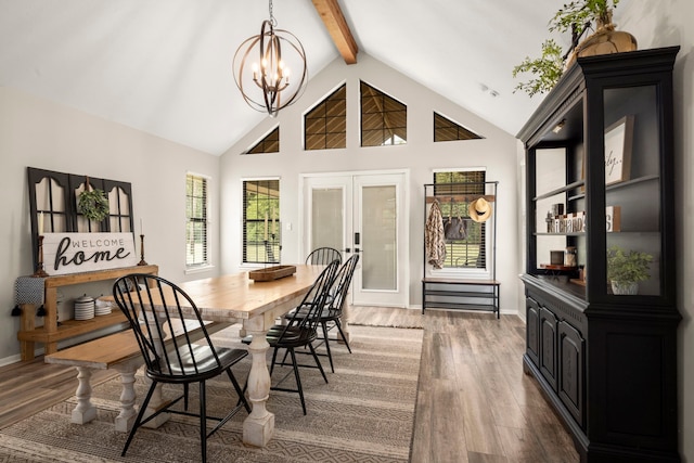 dining room featuring beam ceiling, french doors, dark wood-type flooring, an inviting chandelier, and high vaulted ceiling