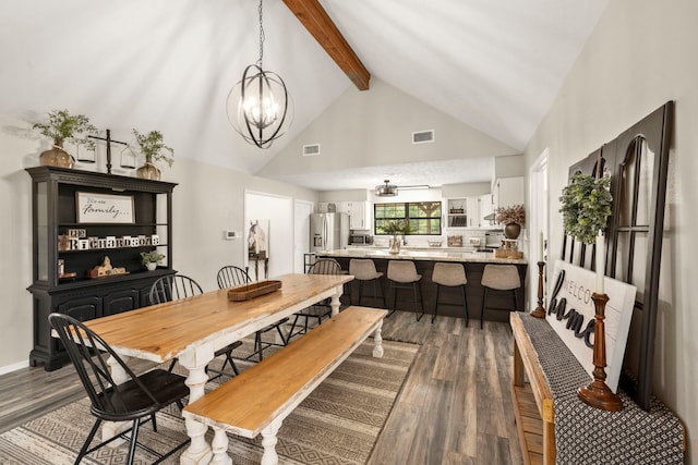 dining area with beam ceiling, dark hardwood / wood-style flooring, high vaulted ceiling, and a notable chandelier