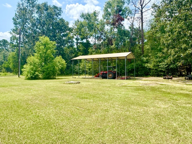 view of yard featuring a carport