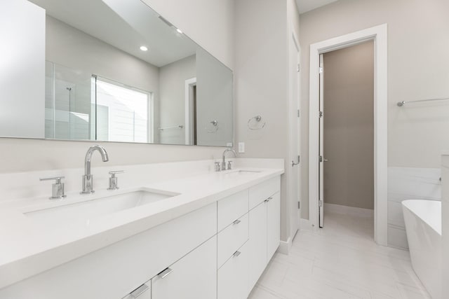 bathroom featuring tile patterned flooring, vanity, and shower with separate bathtub