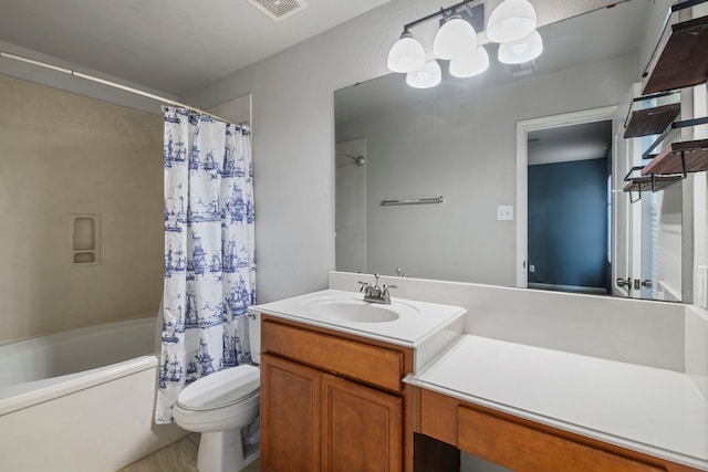 full bathroom featuring vanity, shower / bath combination with curtain, and toilet