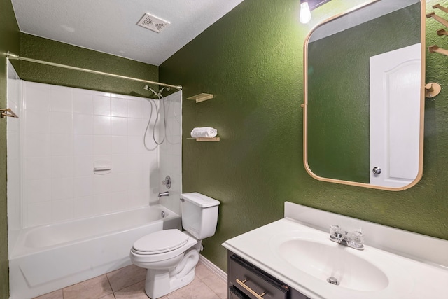 full bathroom with bathtub / shower combination, vanity, a textured ceiling, tile patterned flooring, and toilet