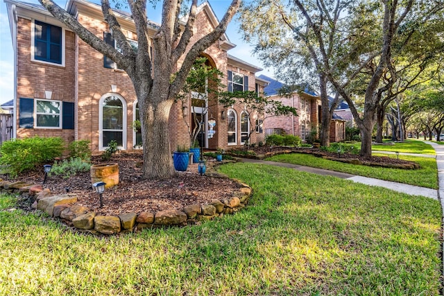 exterior space with a front lawn