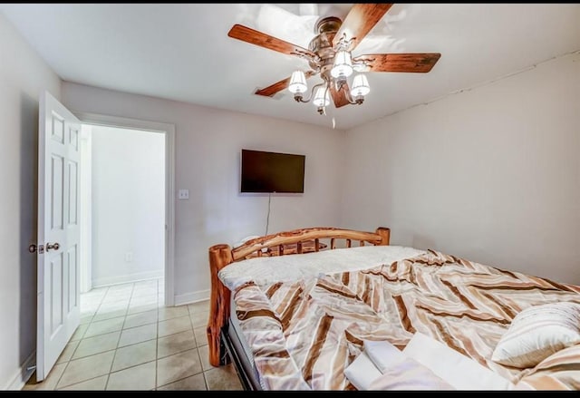 bedroom featuring ceiling fan and light tile patterned floors