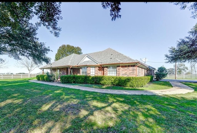 view of front of home with a front lawn