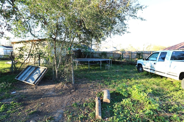 view of yard with a trampoline