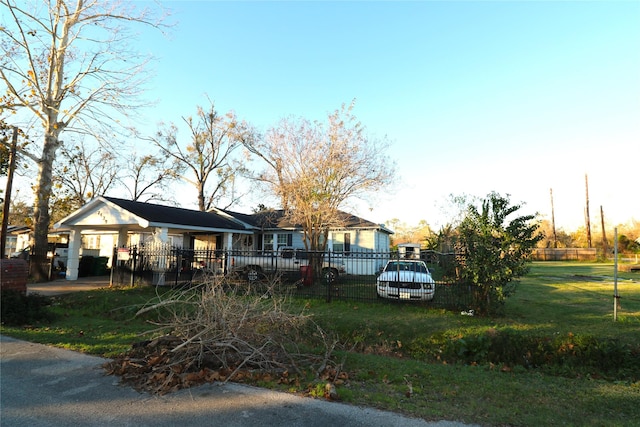 view of front of property with a front lawn