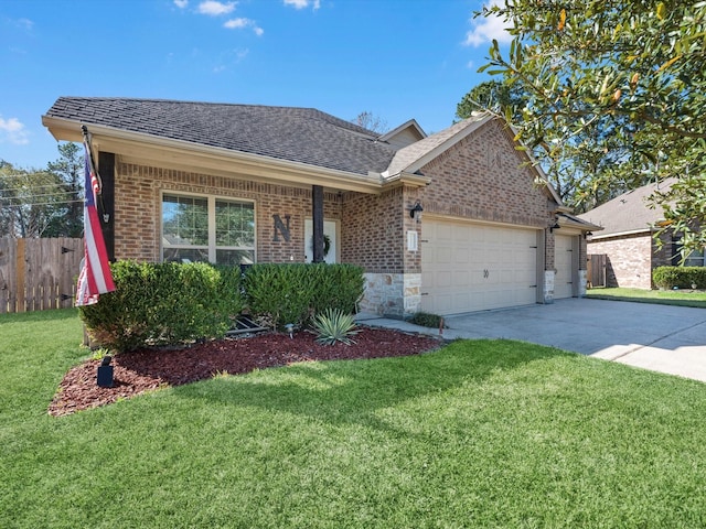 view of front facade with a garage and a front lawn