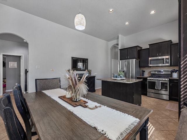 dining room featuring light tile patterned floors