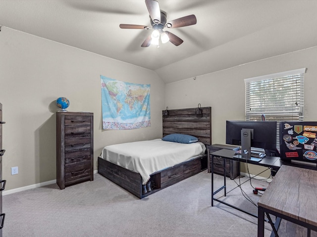 carpeted bedroom featuring ceiling fan and lofted ceiling