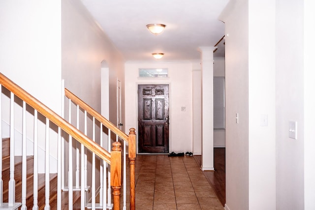 view of tiled foyer entrance