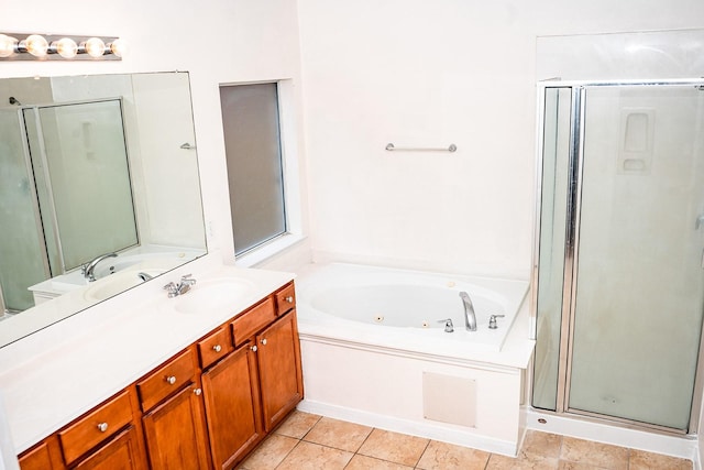 bathroom featuring vanity, tile patterned floors, and independent shower and bath