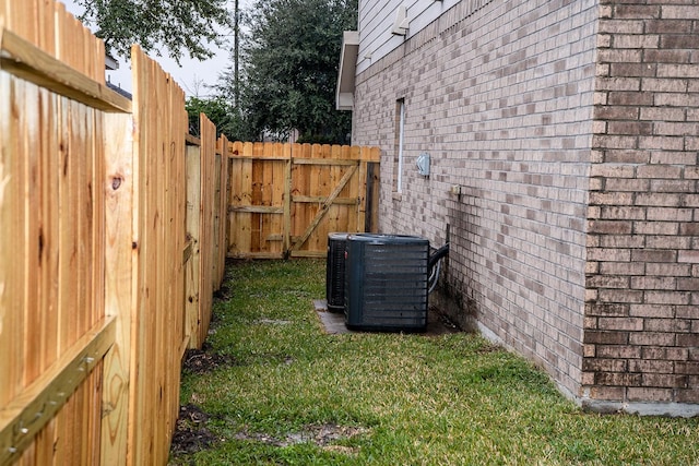 view of yard featuring central AC