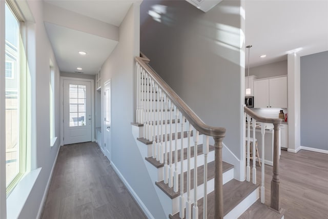 interior space with hardwood / wood-style flooring