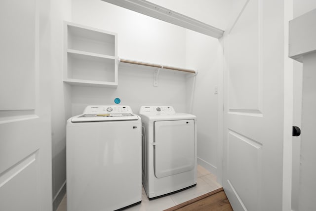 laundry area with washer and clothes dryer