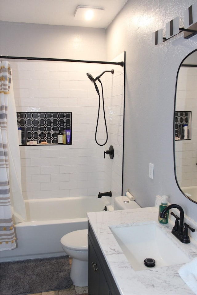 full bathroom featuring vanity, toilet, and shower / bathtub combination with curtain