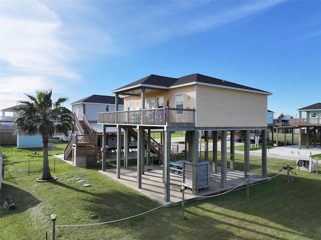 back of property featuring a yard and a patio area