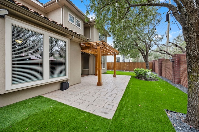 view of yard with a pergola and a patio area