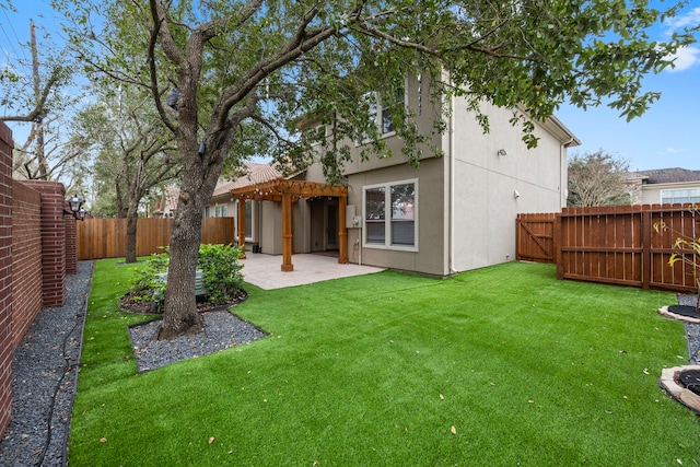 rear view of house featuring a pergola, a patio area, and a lawn