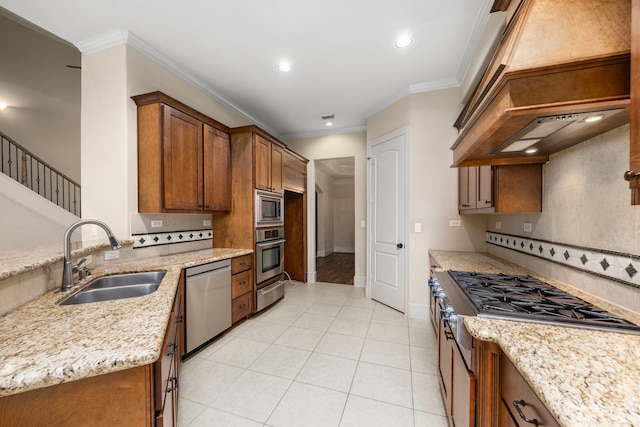 kitchen featuring sink, decorative backsplash, ornamental molding, light stone counters, and stainless steel appliances