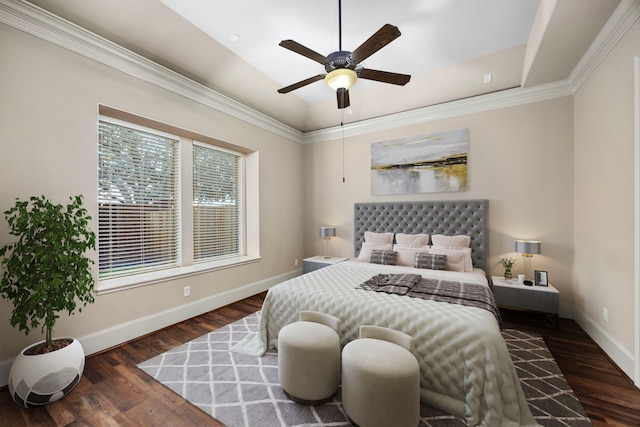 bedroom featuring ceiling fan, dark hardwood / wood-style floors, and ornamental molding