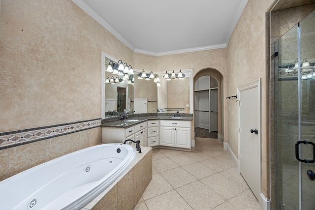 bathroom featuring tile patterned floors, crown molding, vanity, and independent shower and bath