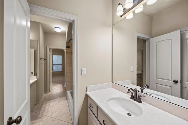 bathroom with tile patterned floors and vanity