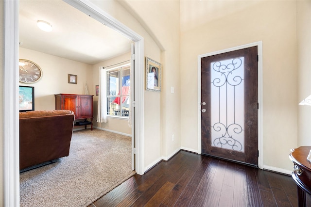 entryway with dark wood-type flooring