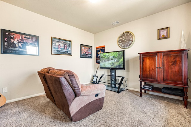 sitting room with light colored carpet